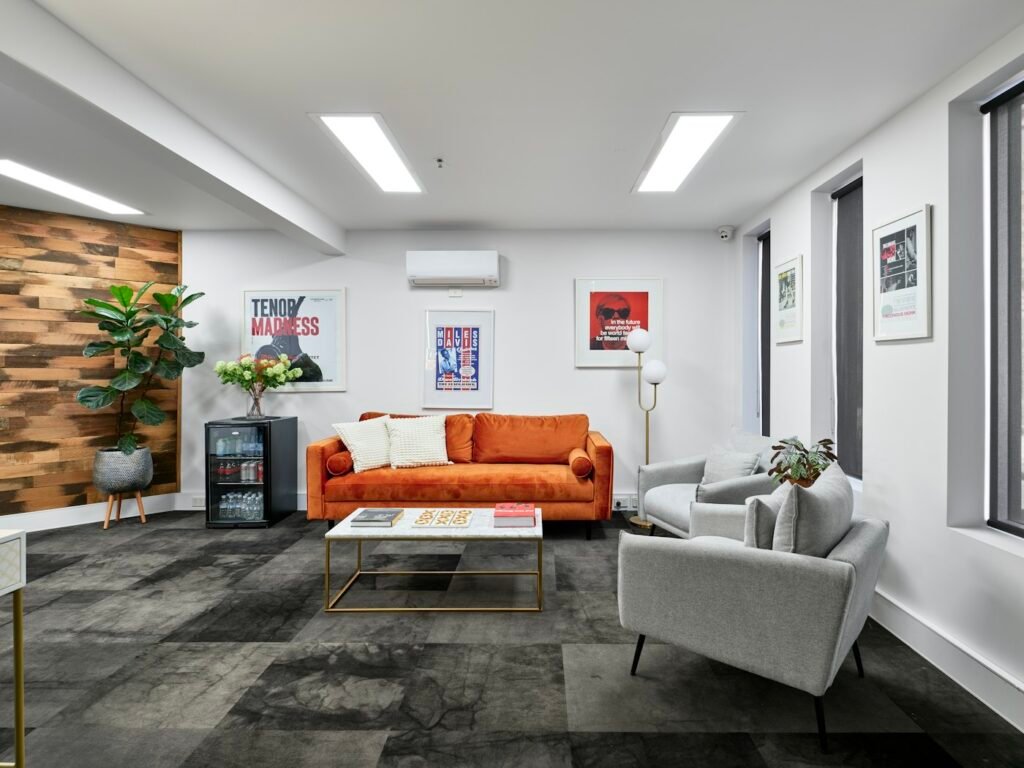 Lounge with grey carpet flooring