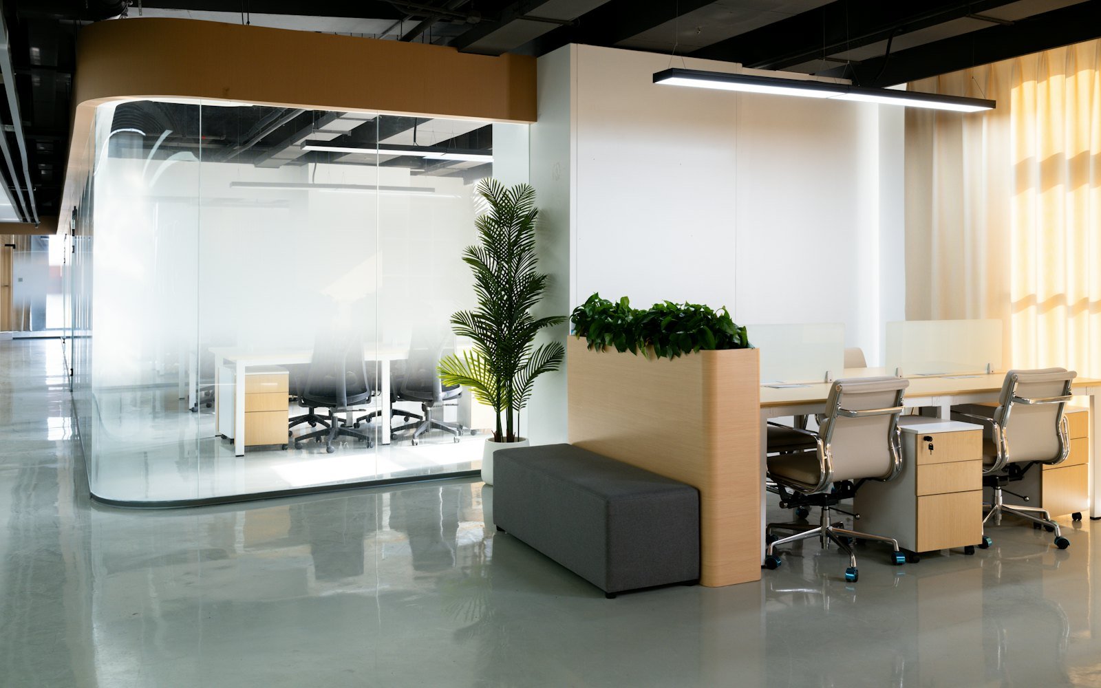Open-plan office with glass meeting room