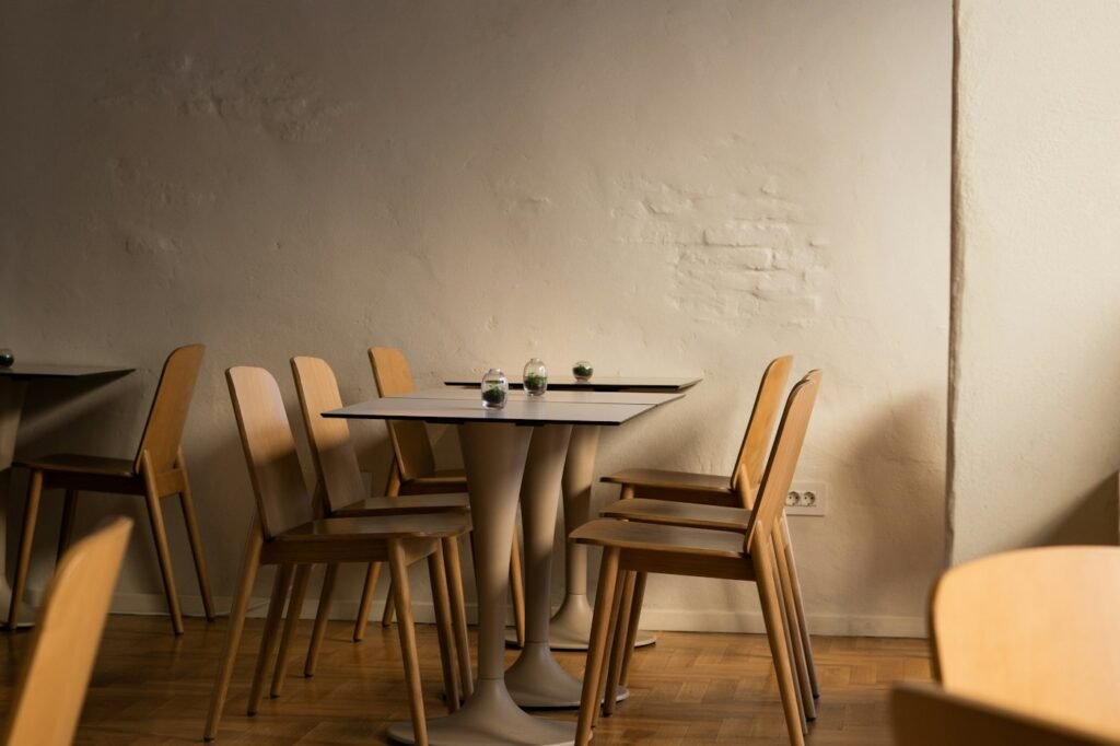 Café with round tables and timber chairs